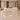 Ivory fluted reception counter in the same furnished visitor lobby, 45-degree view