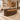 Dark wood curved reception counter with warm upper lighting in a furnished office, 45-degree view