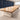 Oak conference table with ivory central cable band, two dark cable covers and ivory cabinet pedestal in the same office, closer product view