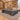 Gray brown wood and charcoal executive desk with right side storage and silver trim in a furnished office, 45-degree view