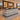 Gray marble pattern reception desk with black trim and LED strip in a furnished office, 45-degree view