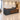 Walnut and charcoal reception counter in a functional hotel lobby, high camera elevation