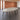 Light gray oval conference table with six black legs and two silver cable covers — full office view in the same office