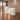 Lurpes ivory curved reception counter in a taupe office lobby, elevated camera view