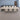 Rectangular Reception Desk 23-236 in Wide with Cable Management for Office Lobby shown in a functional office environment, low camera elevation