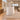 Warm ivory curved reception desk in the same office, low front view