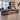 Modern Executive Desk with Curved, Cable Management & Side Storage for, office scene left front view, camera angle 45 degrees