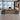 Modern Executive Desk with Curved, Cable Management & Side Storage for, office scene front view, camera angle 0 degrees