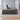 Gray oak executive desk in office - side view