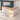 L-shaped cream and oak reception desk in office - 45-degree view