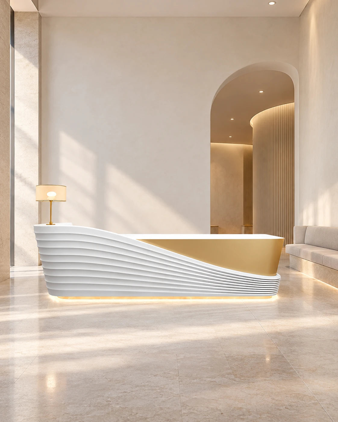 A white-and-gold reception desk in a warm, understated interior